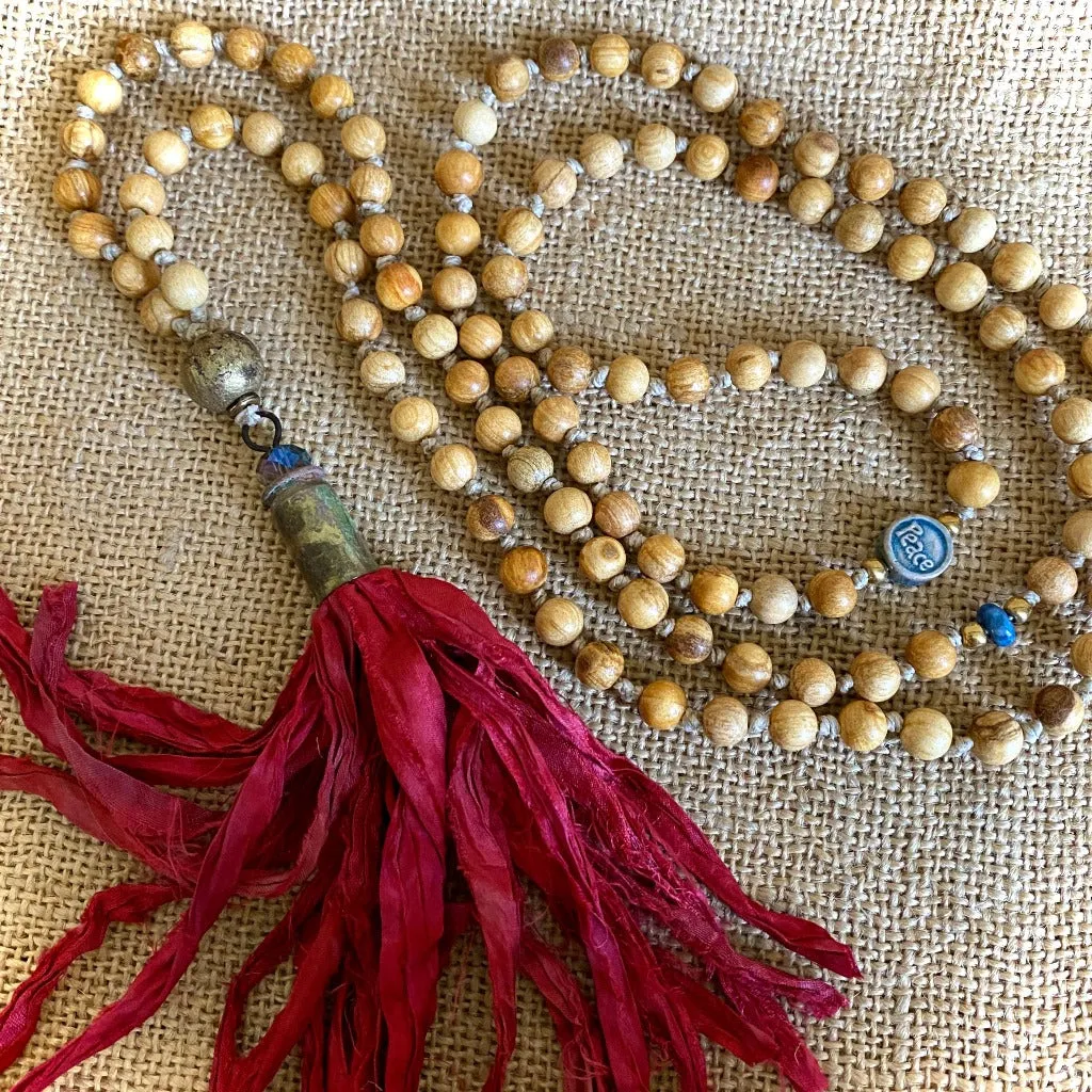 Palo Santo Mala with Nigerian Brass Guru Bead & Red Sari Silk Tassel