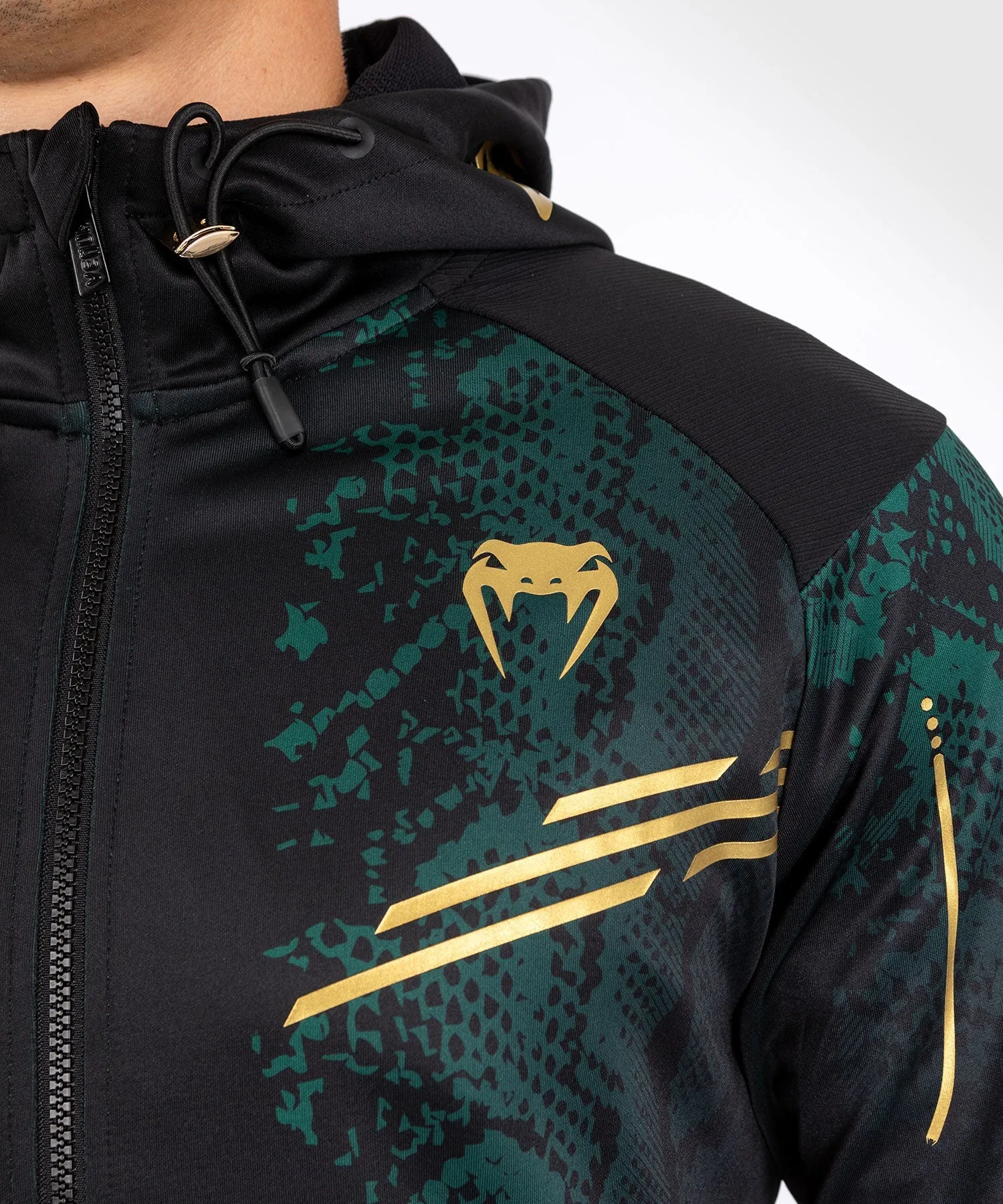 Venum Personalized UFC Adrenaline Authentic Mens Fight Night Walkout Hoodie - Special Emerald Edition in Green, Black, and Gold.